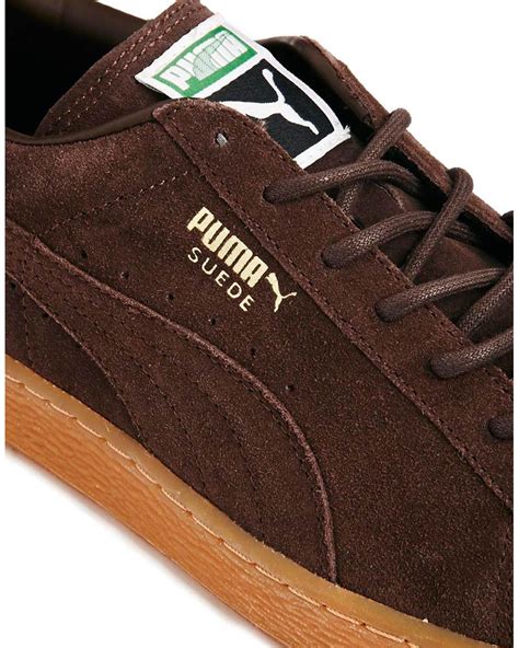 brown puma sneakers